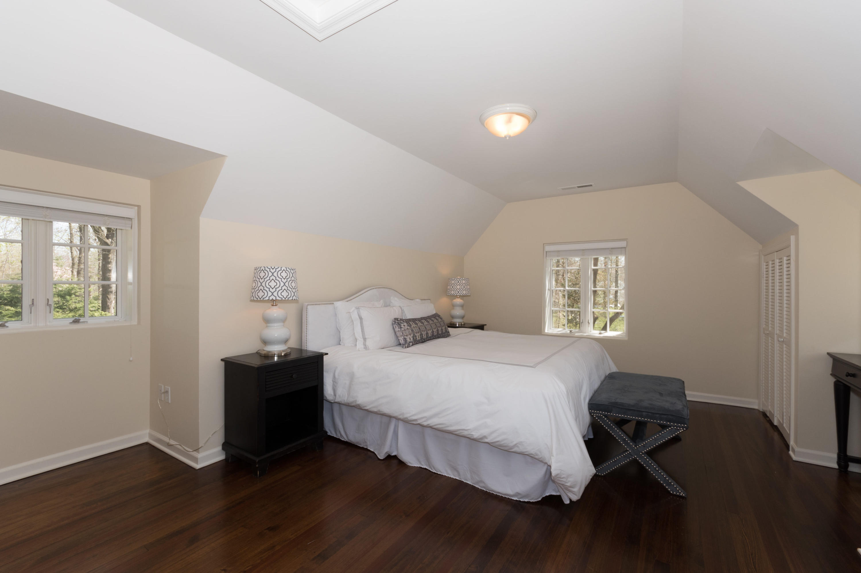170 Ridge Acres Road Darien, CT 06820 - Photo 27 of 50 a bedroom with a bed and a window