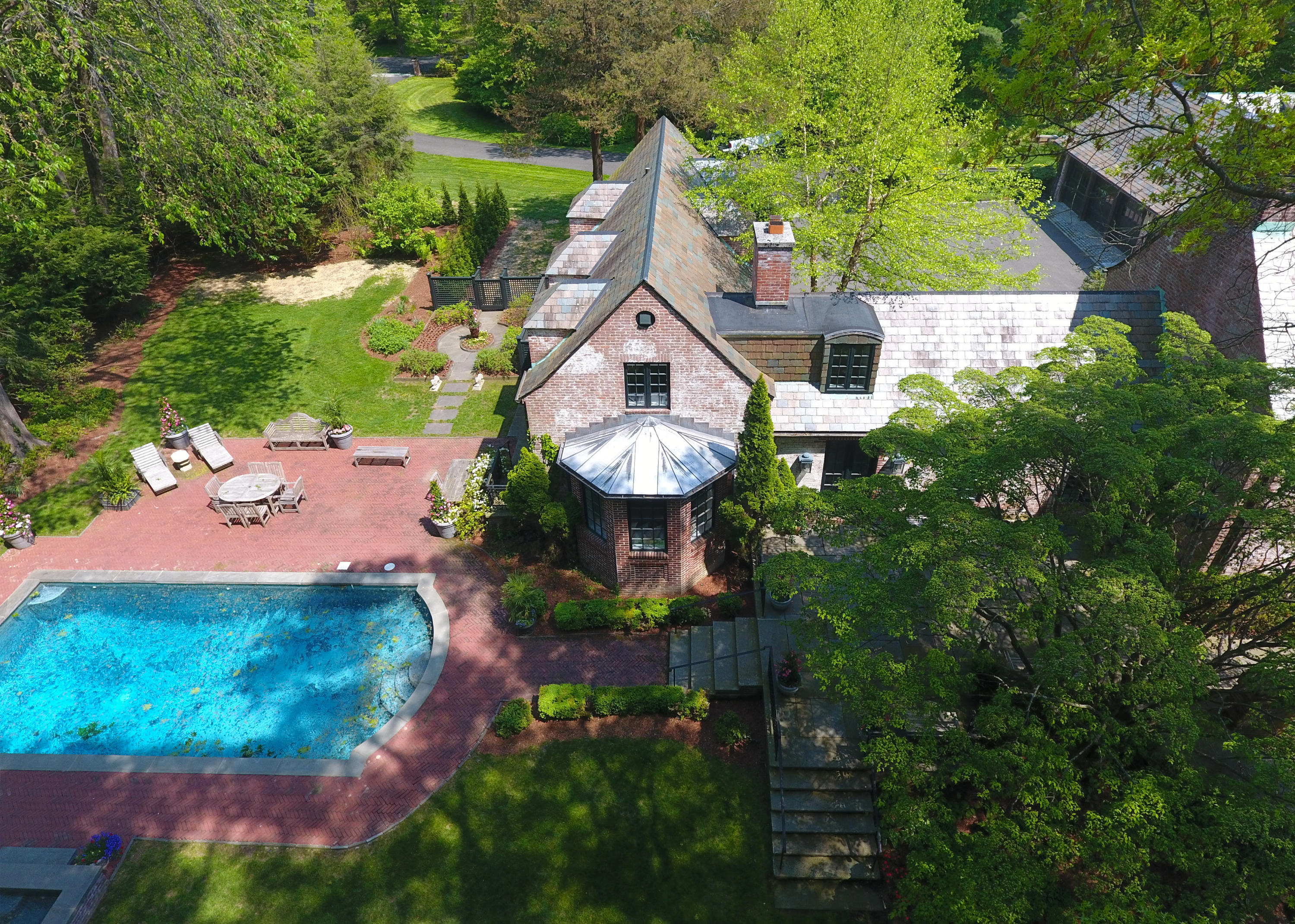170 Ridge Acres Road Darien, CT 06820 - Photo 3 of 50 an aerial view of a house with swimming pool and garden