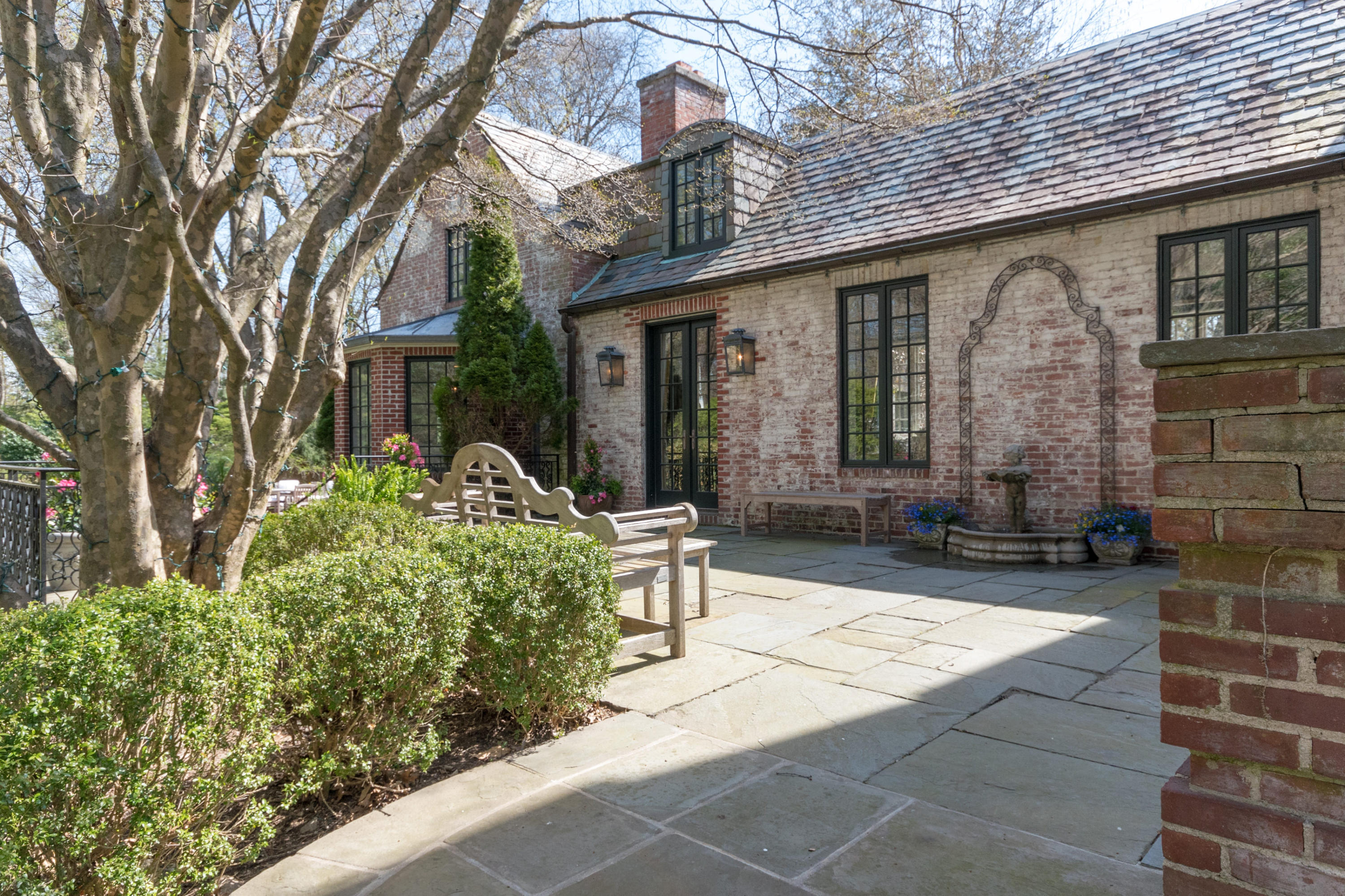 170 Ridge Acres Road Darien, CT 06820 - Photo 41 of 50 a front view of a house with garden
