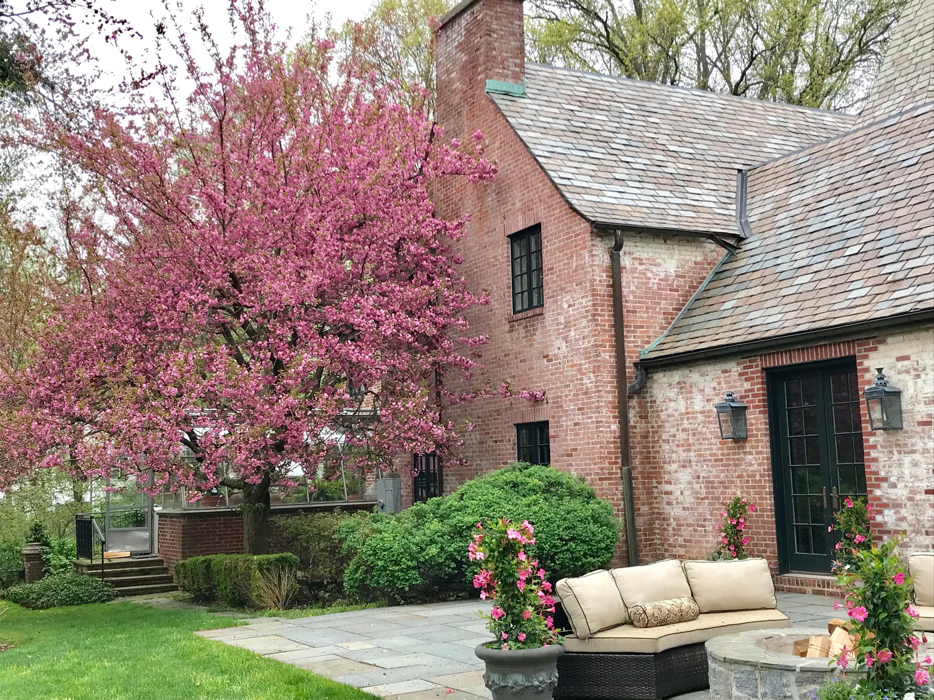 170 Ridge Acres Road Darien, CT 06820 - Photo 44 of 50 front view of a house with a garden