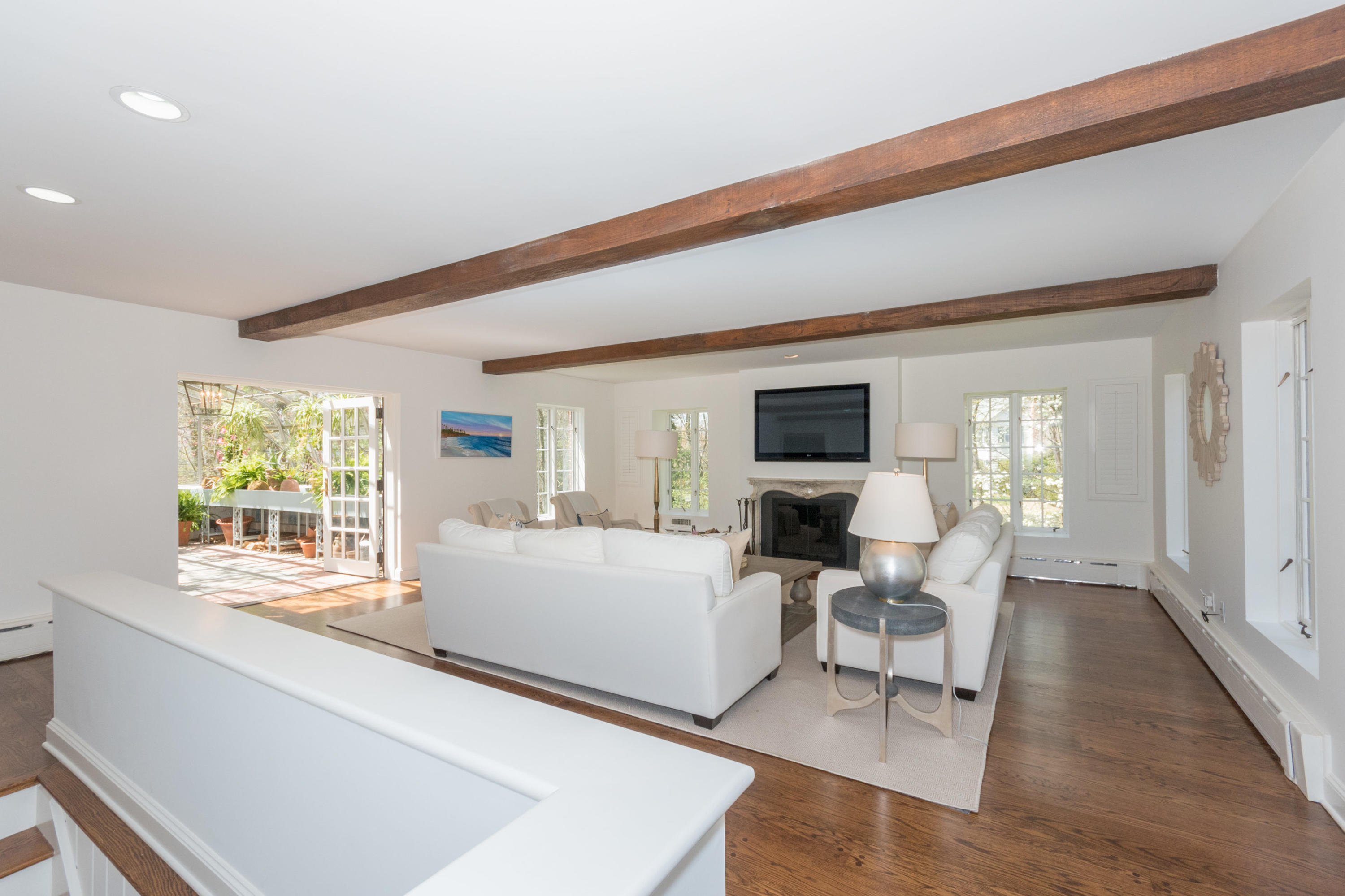 170 Ridge Acres Road Darien, CT 06820 - Photo 10 of 50 a living room with furniture and a flat screen tv