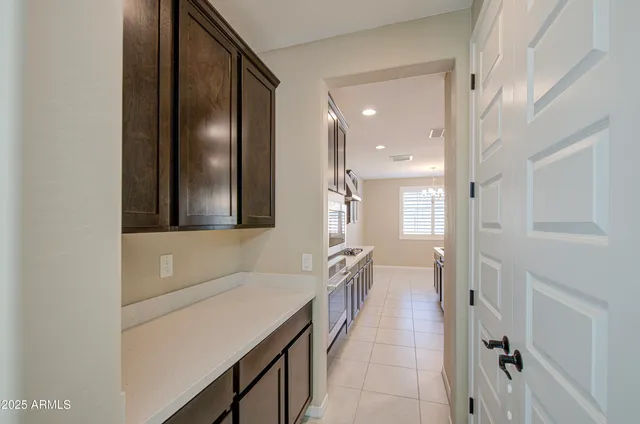 a view of a workspace with furniture
