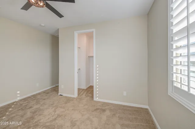 a view of a backyard of the house