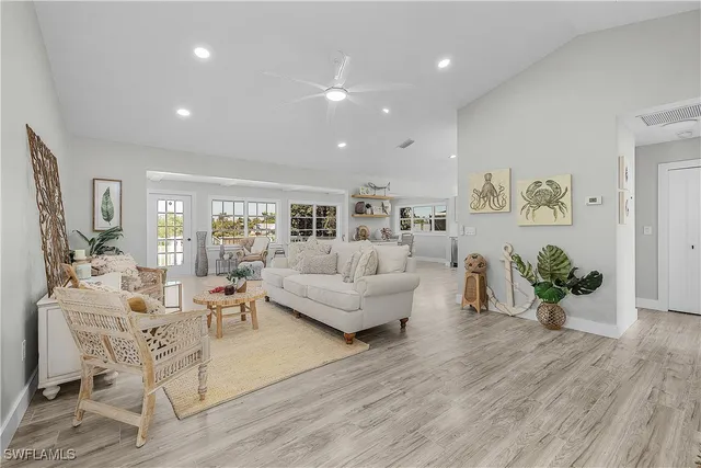 a kitchen with a refrigerator stove and microwave