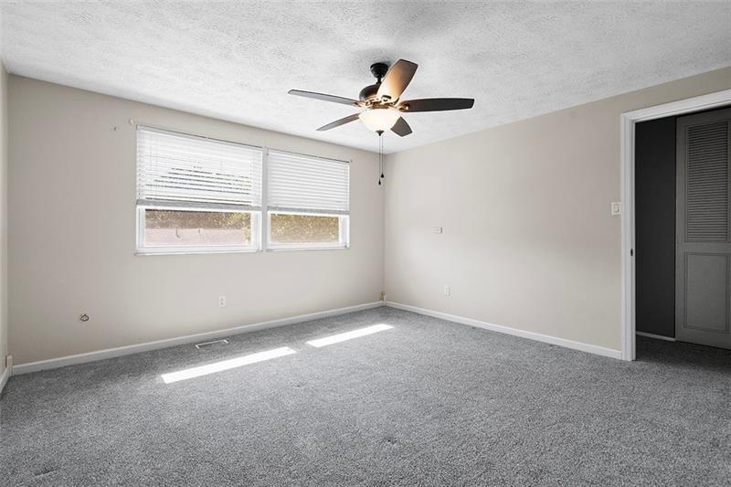 624 Deer Watch Road Bridgeville, PA 15017 - Photo 6 of 7 a view of an empty room with a window