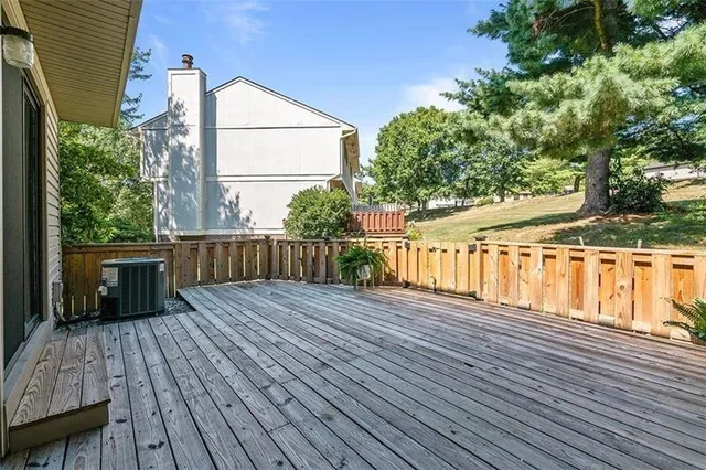 a view of deck with wooden floor and outdoor seating