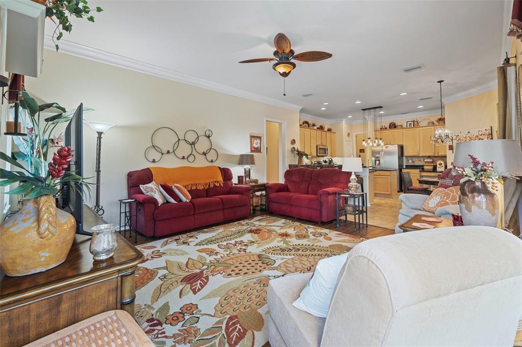 25745 Unbridled Court Wesley Chapel, FL 33544 - Photo 31 of 64 a living room with furniture