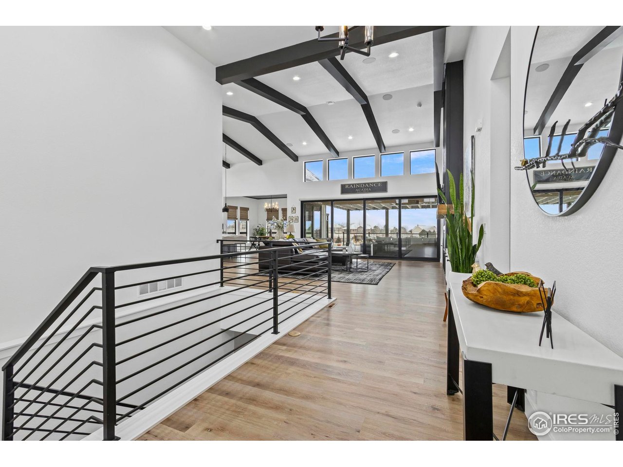 1907 Spring Bloom Drive Windsor, CO 80550 - Photo 2 of 49 Gorgeous foyer opens to soaring ceilings