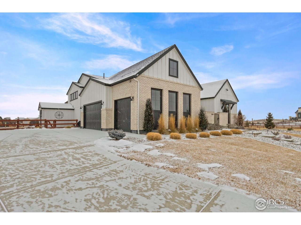 1907 Spring Bloom Drive Windsor, CO 80550 - Photo 32 of 49 Three car garage