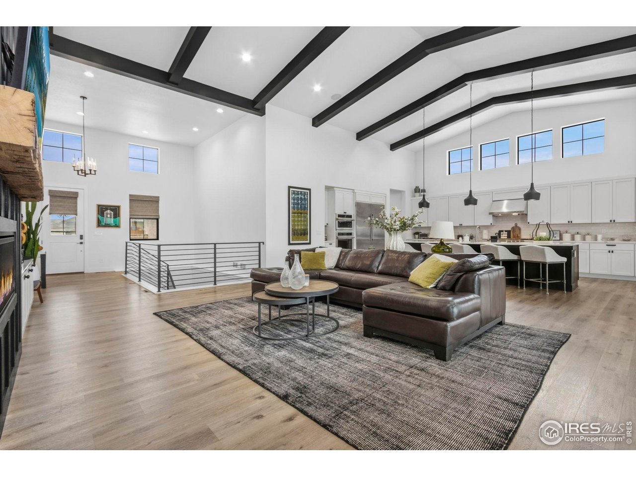 1907 Spring Bloom Drive Windsor, CO 80550 - Photo 49 of 49 Open floor plan with beamed ceilings