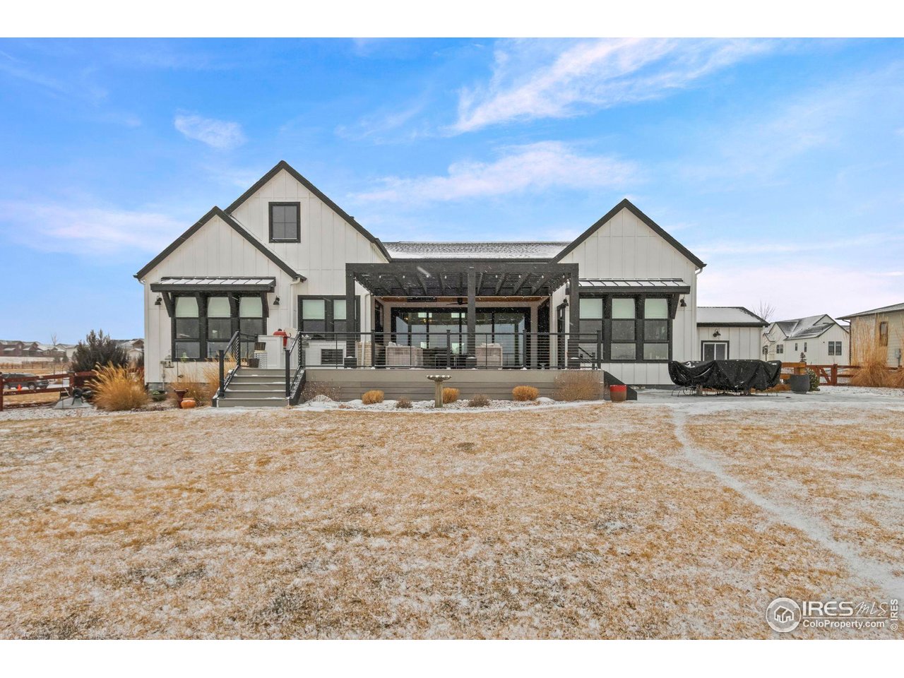 1907 Spring Bloom Drive Windsor, CO 80550 - Photo 8 of 49 Impressive Back Exterior with multiple places to entertain
