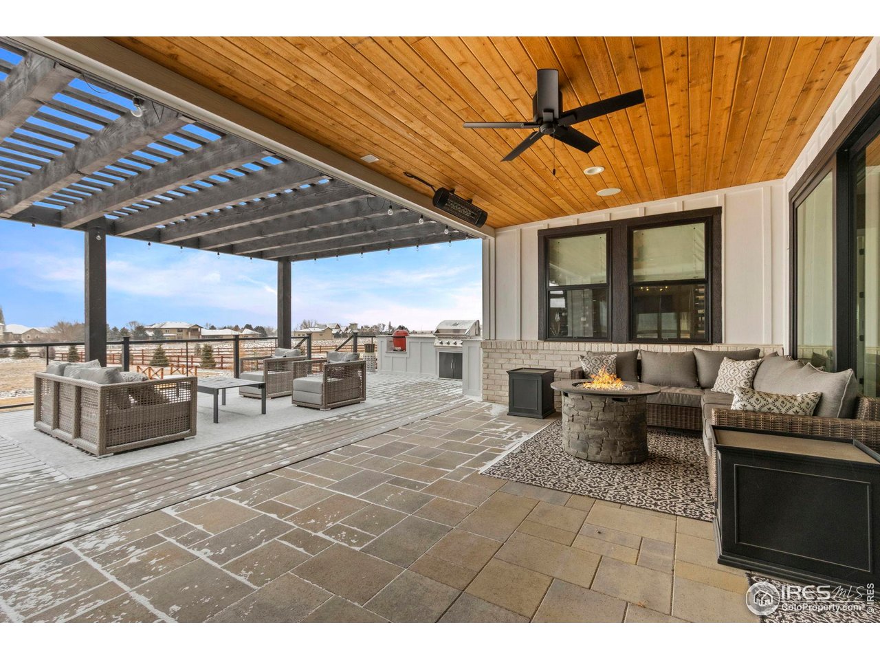 1907 Spring Bloom Drive Windsor, CO 80550 - Photo 9 of 49 Covered and heated patio area
