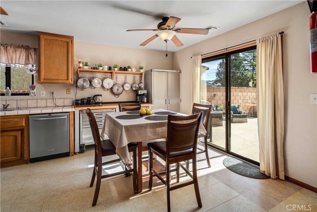 43230 Lookabout Road Lake Hughes, CA 93532 - Photo 11 of 40 a dining room with furniture a chandelier and window