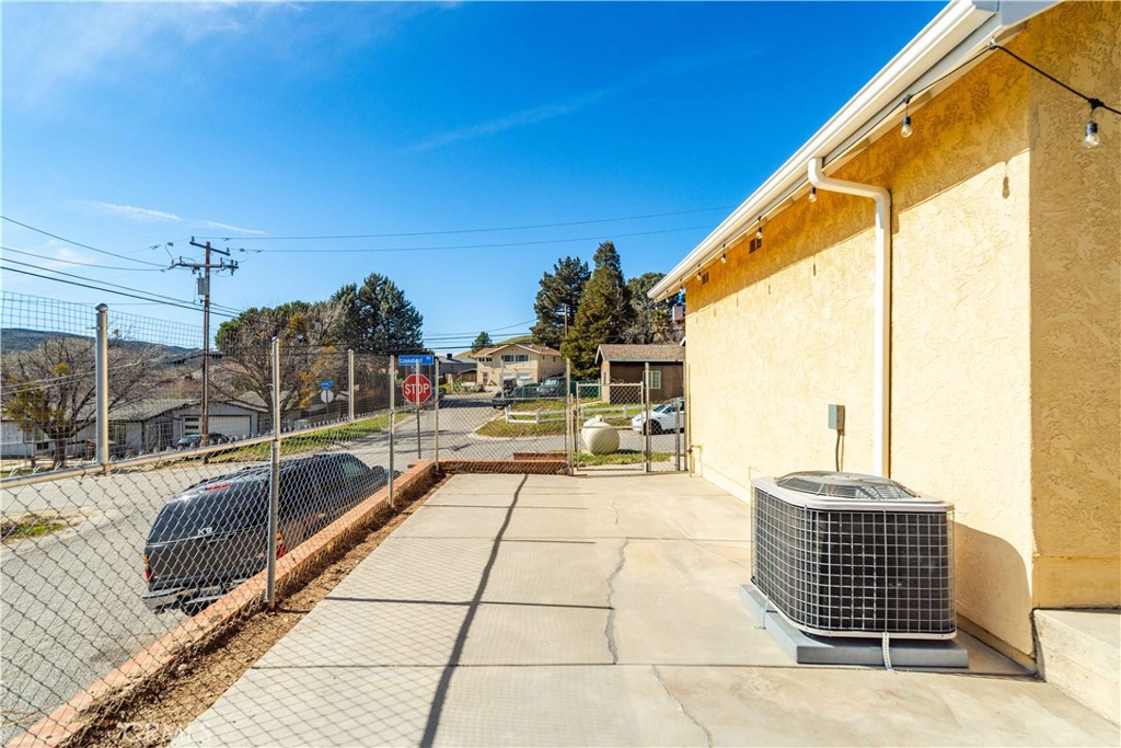 43230 Lookabout Road Lake Hughes, CA 93532 - Photo 29 of 40 a swimming pool with outdoor seating and yard