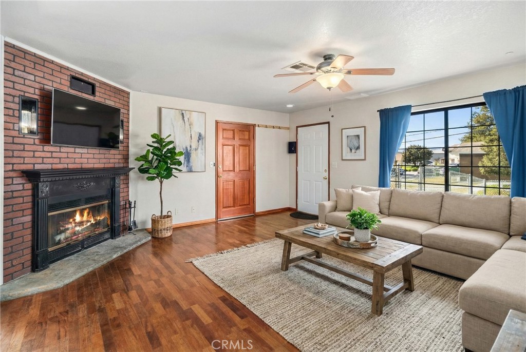 43230 Lookabout Road Lake Hughes, CA 93532 - Photo 4 of 40 a living room with furniture and a fireplace