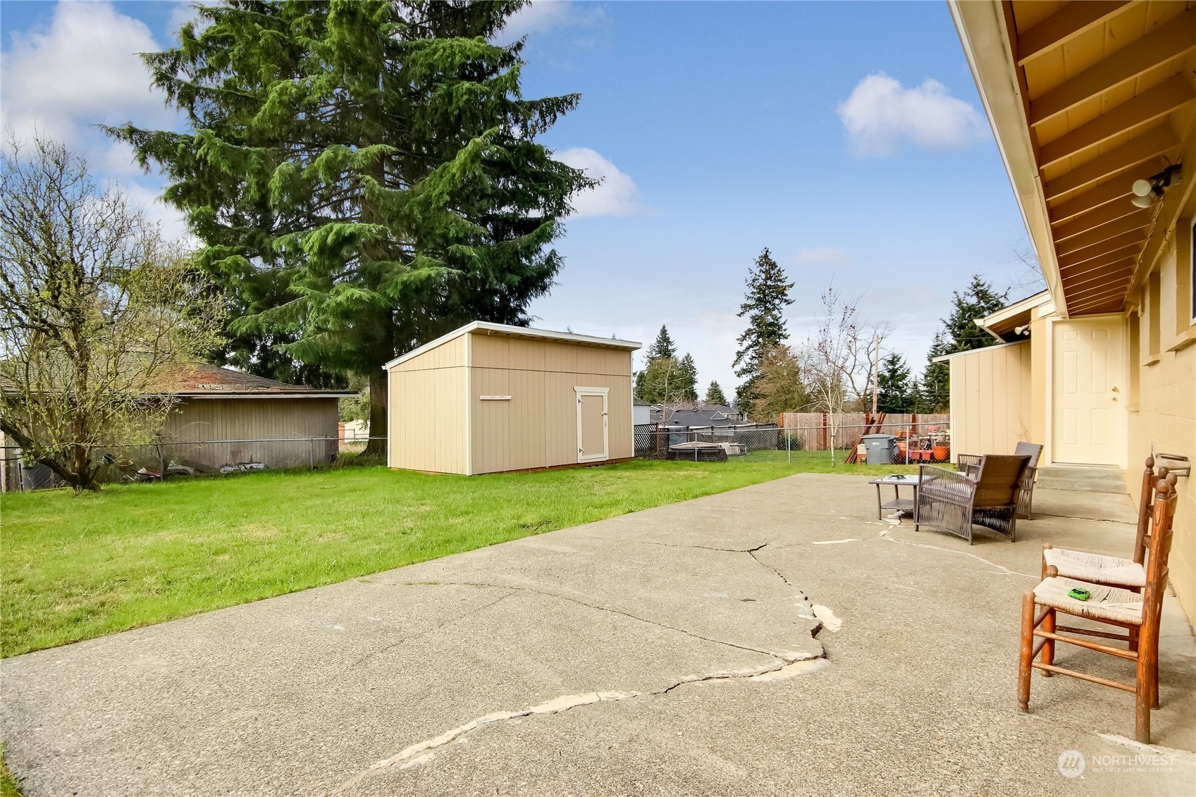 3513 Northeast 9th Street Renton, WA 98056 - Photo 30 of 40 a view of a backyard with sitting area