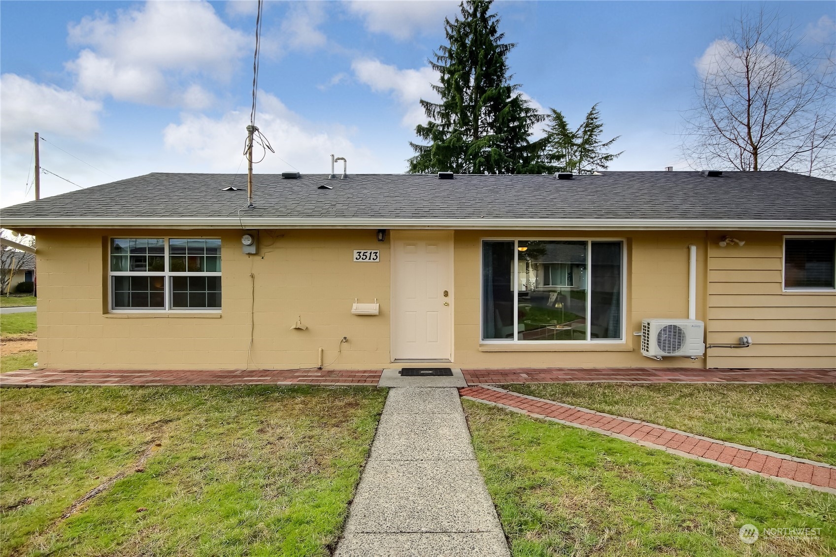3513 Northeast 9th Street Renton, WA 98056 - Photo 7 of 40 a front view of a house with garden