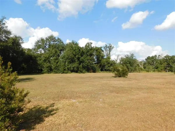 a view of ocean and mountain
