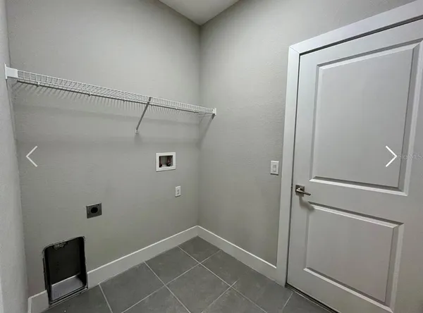 a view of a room with racks on the wall
