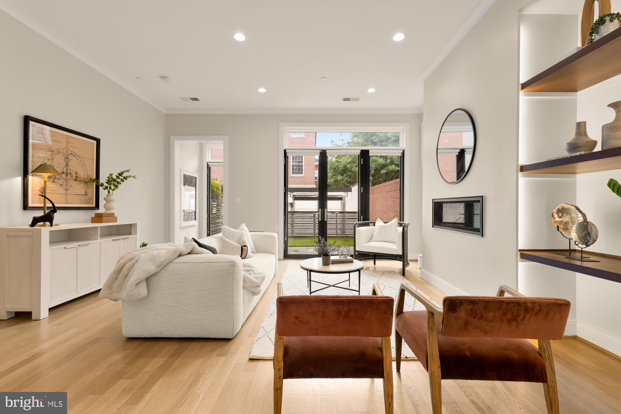 1311 D Street Southeast Washington, DC 20003 - Photo 17 of 57 a living room with furniture and wooden floor