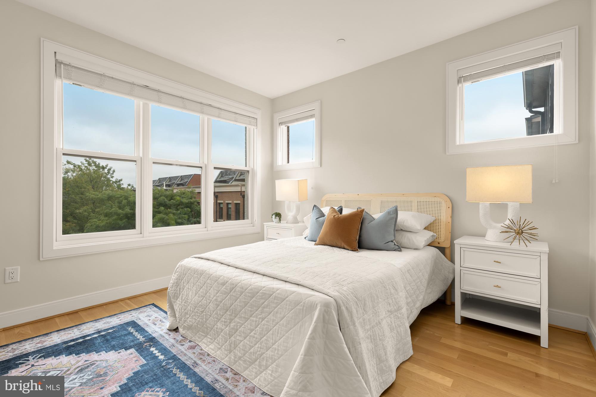 1311 D Street Southeast Washington, DC 20003 - Photo 35 of 57 a bedroom with a bed and a window