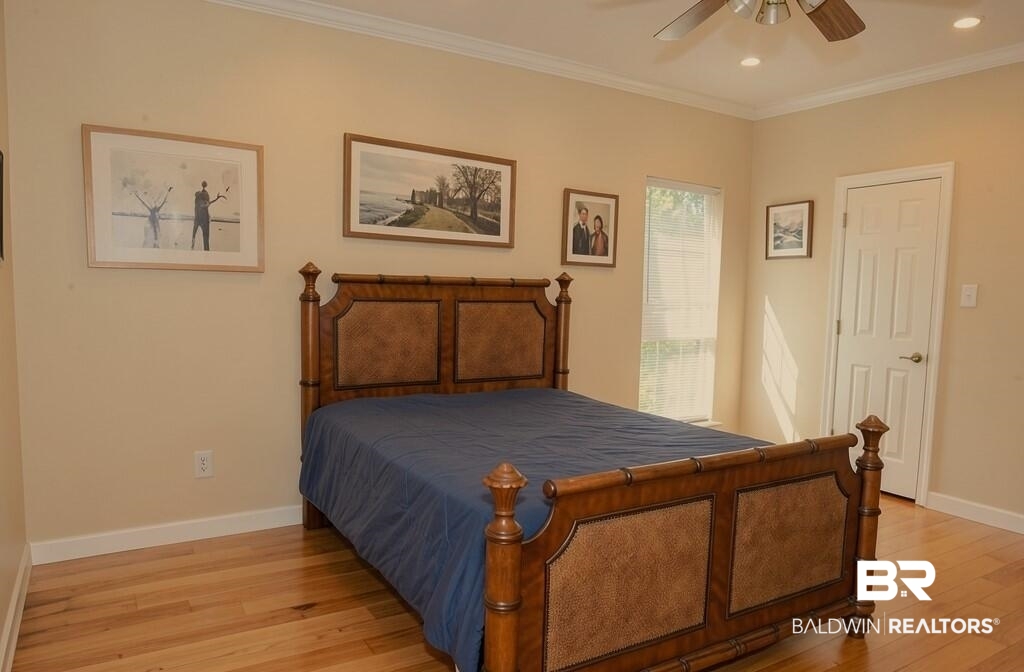 8008 Patricks Landing Road Bay Minette, AL 36507 - Photo 22 of 33 Hardwood flooring, crown molding, and recessed lighting