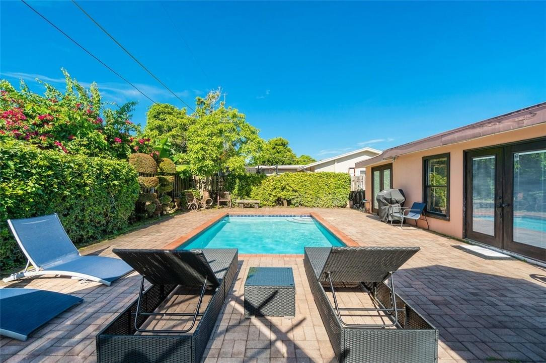 9732 Southwest 1st Place Boca Raton, FL 33428 - Photo 4 of 28 Enjoy entertaining in this backyard.