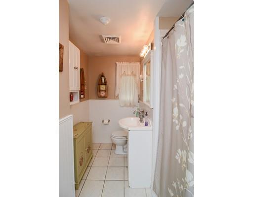 17 Ruthellen Road Chelmsford, MA 01824 - Photo 16 of 42 a bathroom with a sink a toilet and a mirror