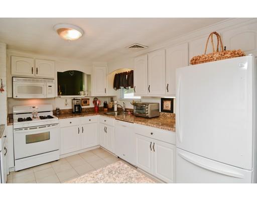 17 Ruthellen Road Chelmsford, MA 01824 - Photo 18 of 42 a kitchen with appliances a sink and cabinets