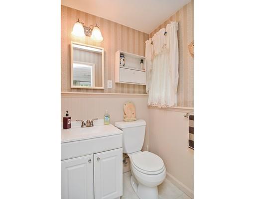 17 Ruthellen Road Chelmsford, MA 01824 - Photo 24 of 42 a bathroom with a sink toilet and mirror