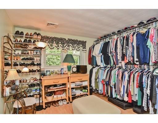 17 Ruthellen Road Chelmsford, MA 01824 - Photo 28 of 42 a view of walk in closet with clothes and shoes