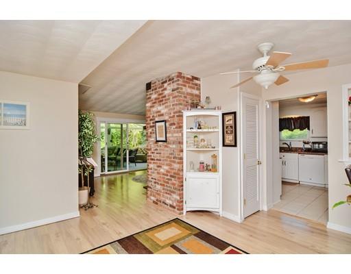 17 Ruthellen Road Chelmsford, MA 01824 - Photo 3 of 42 a view of a livingroom with furniture a chandelier fan and windows