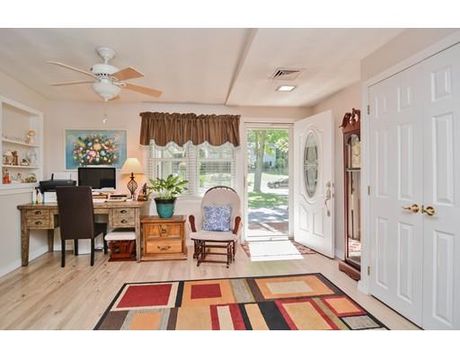 17 Ruthellen Road Chelmsford, MA 01824 - Photo 4 of 42 a living room with furniture a chandelier and a dining table