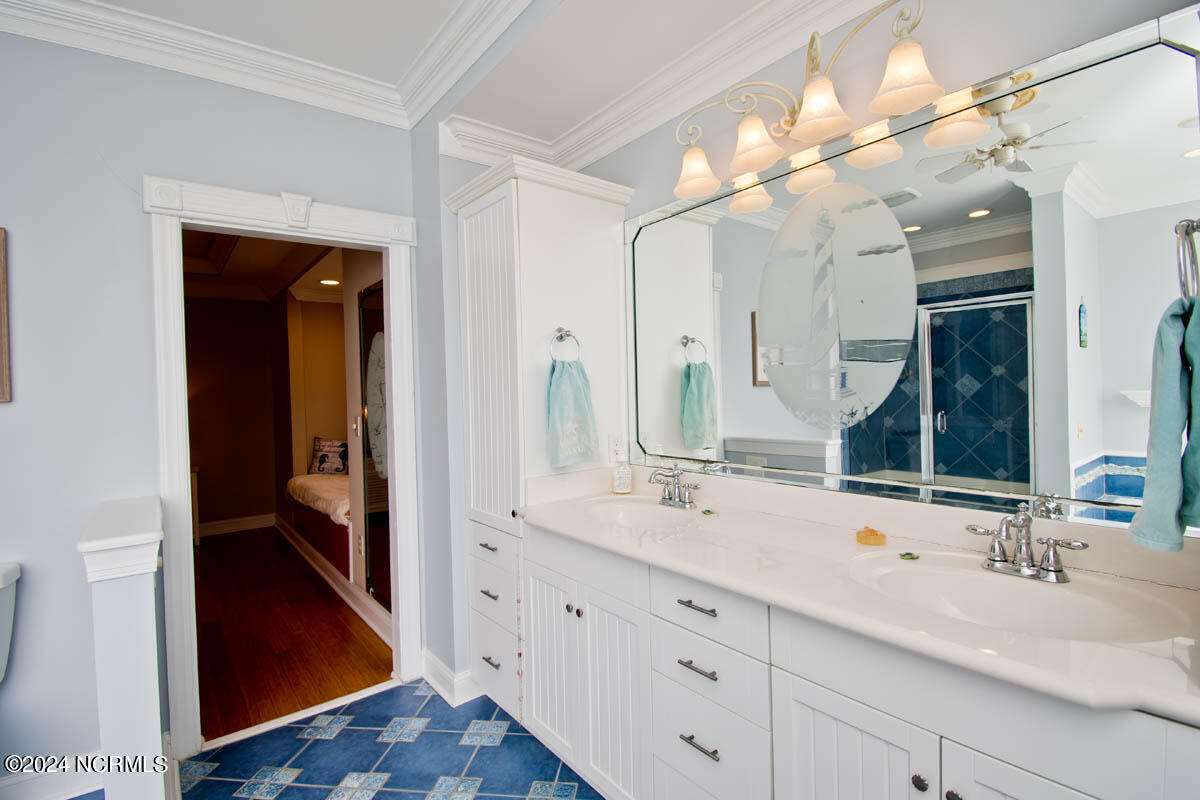 116 Pearl Drive Beaufort, NC 28516 - Photo 27 of 67 Custom Shelving & Double Vanity Sinks