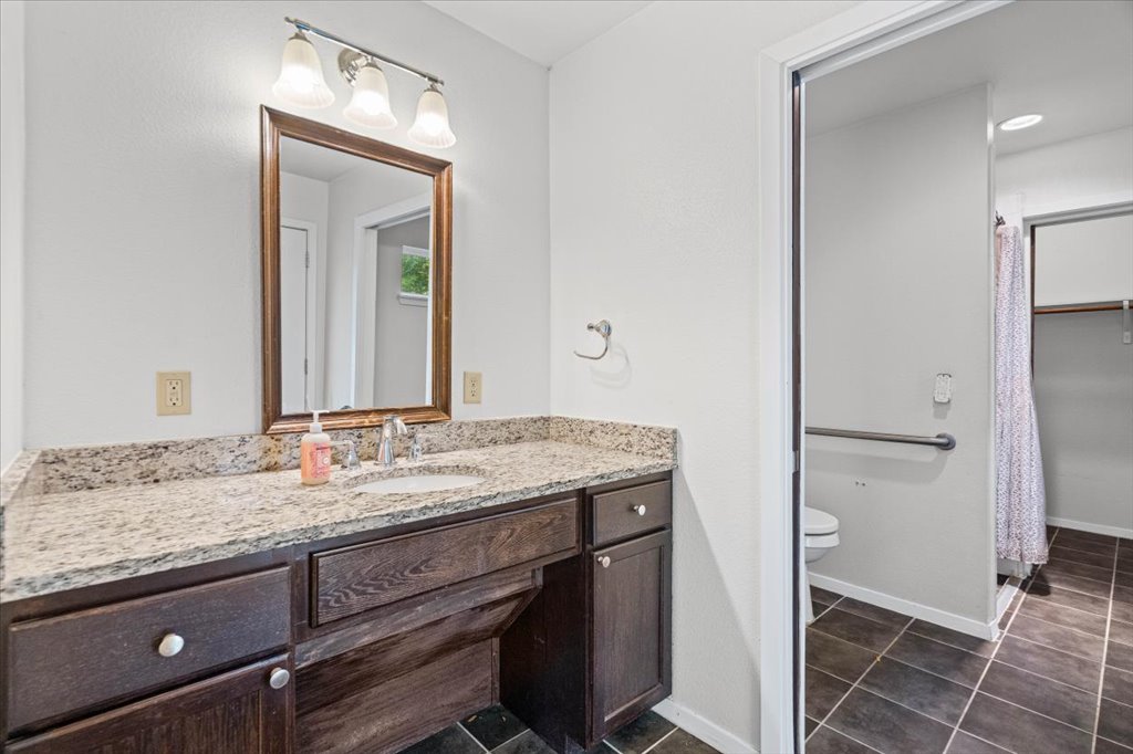 7229 South Brook Drive Austin, TX 78736 - Photo 8 of 20 Downstairs, 2nd primary, 3/4 bath & private entrance.