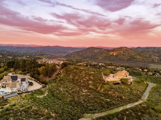 a view of a lake with mountains in the background