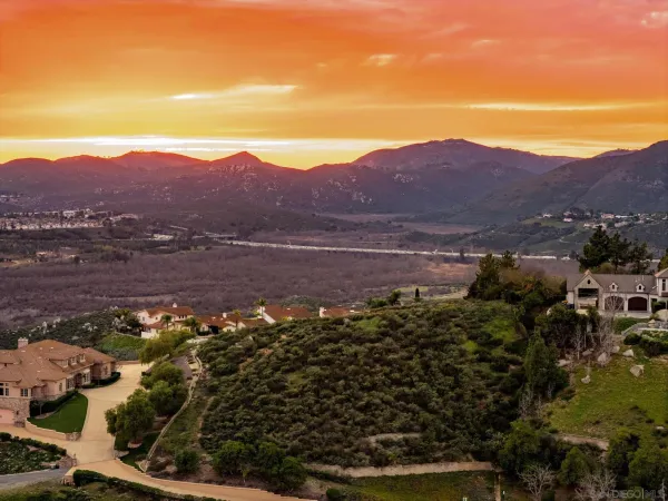 a view of a city with an ocean view