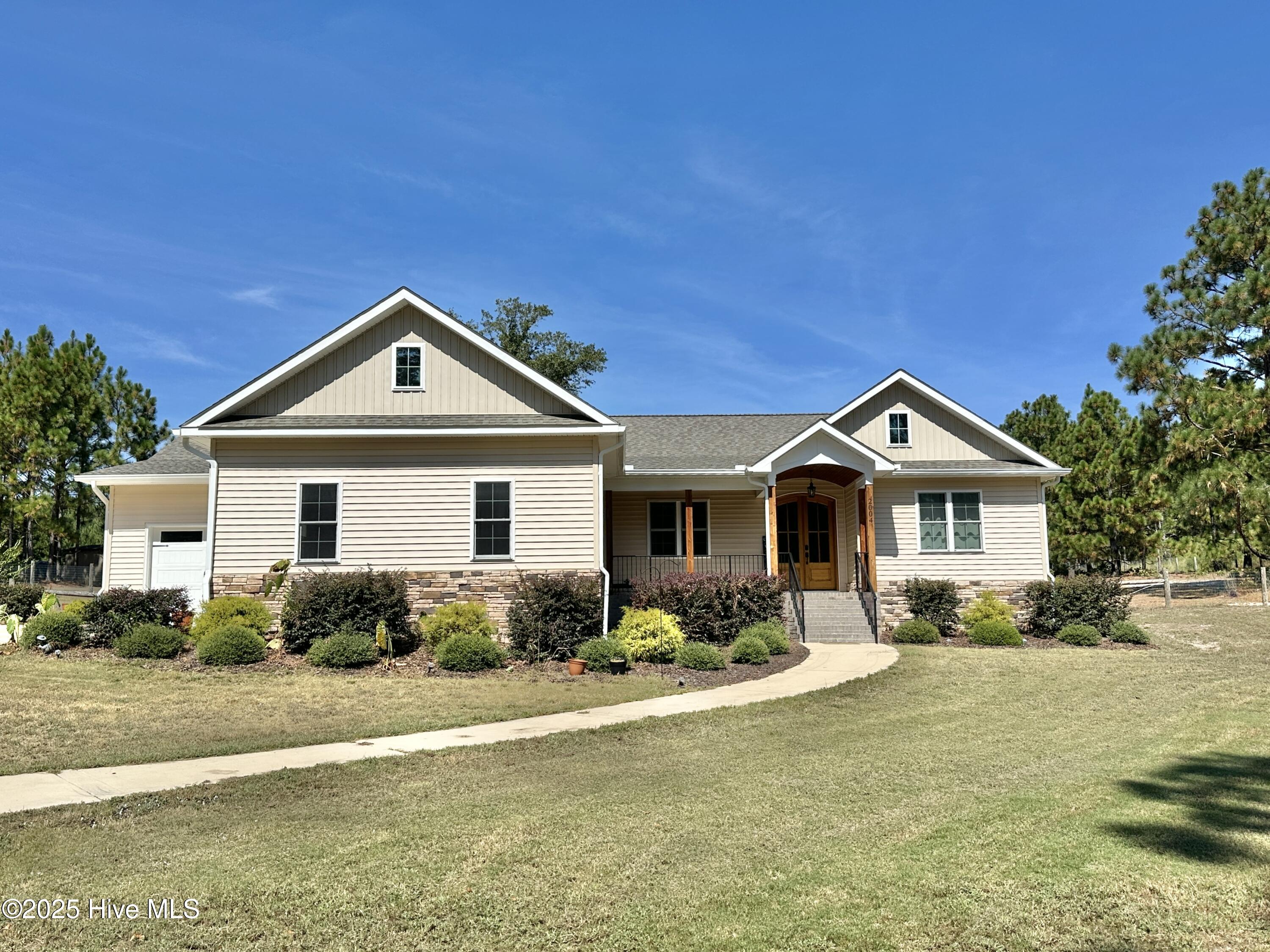 2004 Foxfire Road Jackson Springs, NC 27281 - Photo 1 of 68 Welcome Home