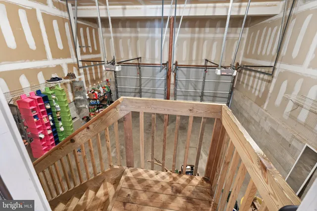 a view of a patio with a table and chairs