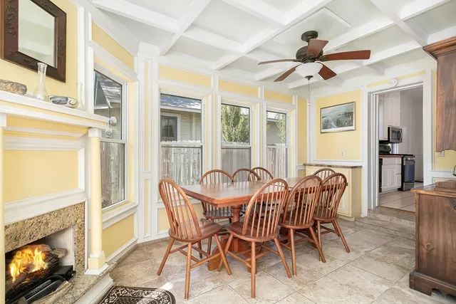 a view of a livingroom with furniture window and wooden floor