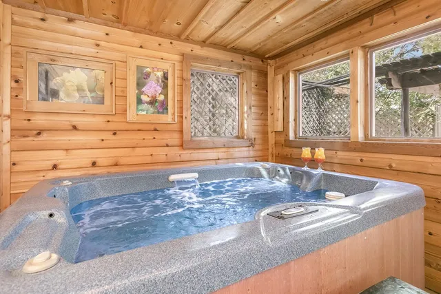 a view of a sink and a granite counter top a rug