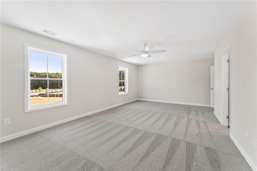 4659 Larkfield Way, Unit 15 Powder Springs, GA 30127 - Photo 14 of 60 a view of an empty room with a window