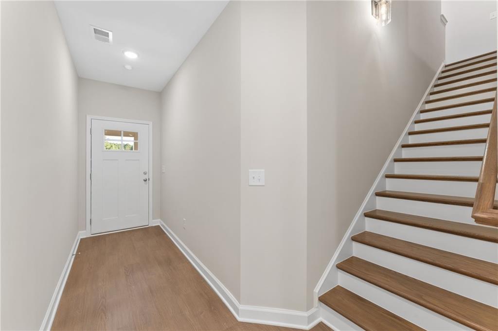 4659 Larkfield Way, Unit 15 Powder Springs, GA 30127 - Photo 3 of 60 a view of entryway with wooden floor