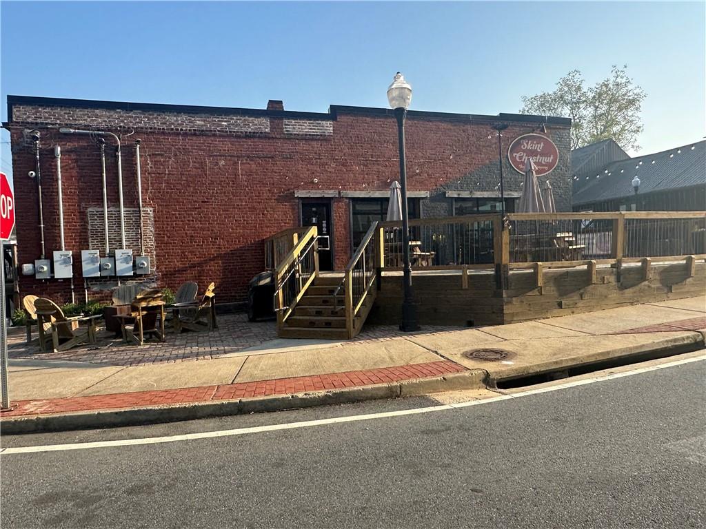 4659 Larkfield Way, Unit 15 Powder Springs, GA 30127 - Photo 39 of 60 a front view of a building with street view
