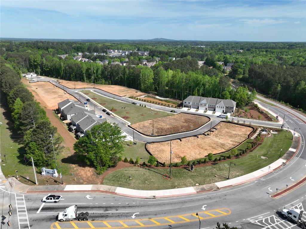 4659 Larkfield Way, Unit 15 Powder Springs, GA 30127 - Photo 56 of 60 a view of a swimming pool with a yard