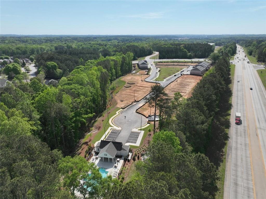 4659 Larkfield Way, Unit 15 Powder Springs, GA 30127 - Photo 59 of 60 an aerial view of a house with lots of trees