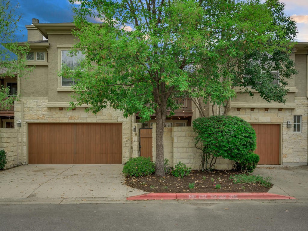 3406 Menchaca Road, Unit 34 Austin, TX 78704 - Photo 1 of 1 front view of a house with a yard
