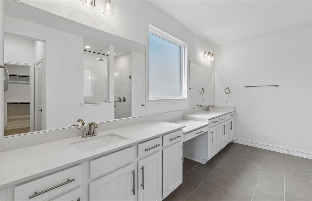 11220 Abbotsbury Road Fort Worth, TX 76052 - Photo 11 of 32 a bathroom with a sink double vanity and a mirror