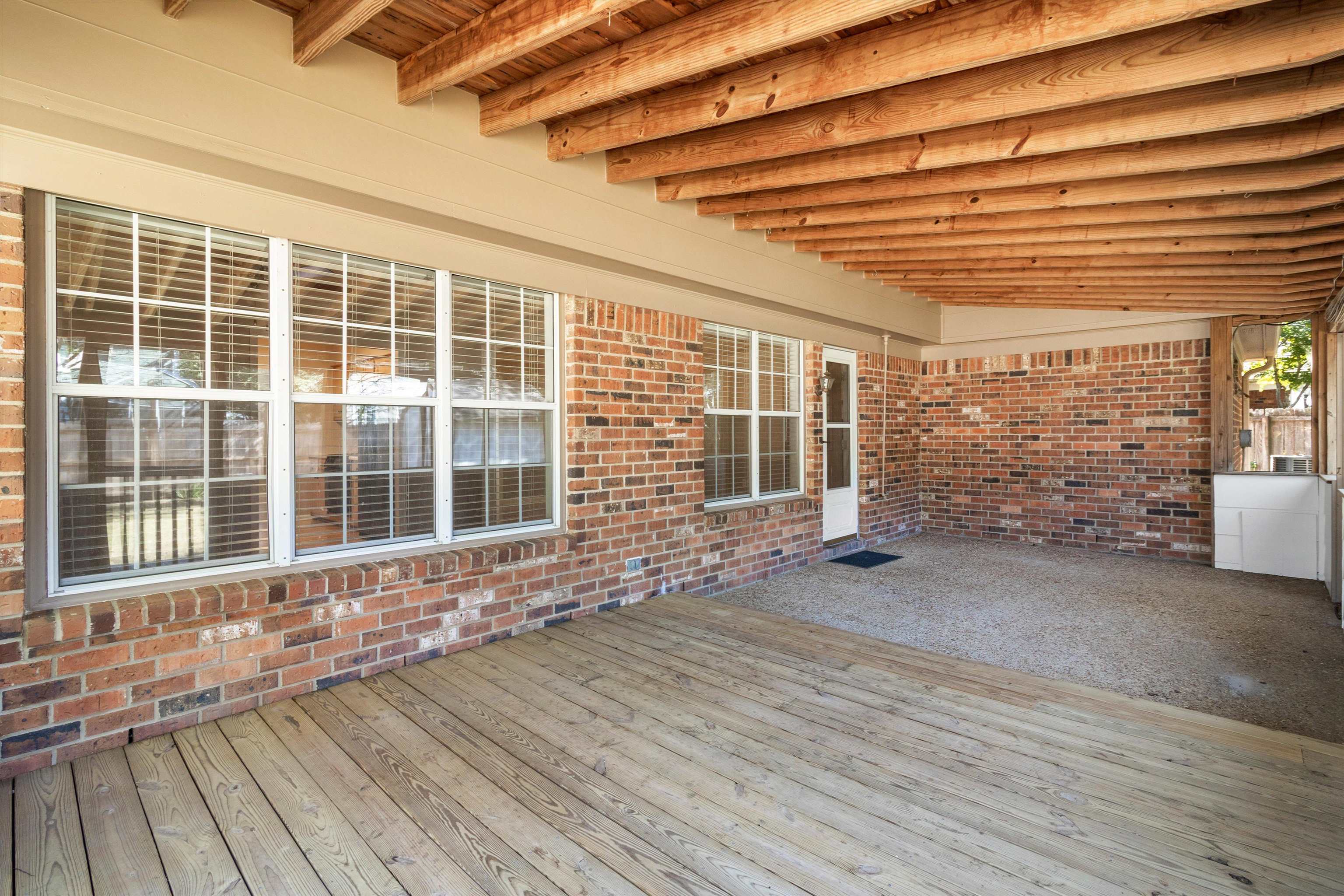 465 Harts Way Drive Collierville, TN 38017 - Photo 25 of 29 a view of a porch with wooden floor and fence