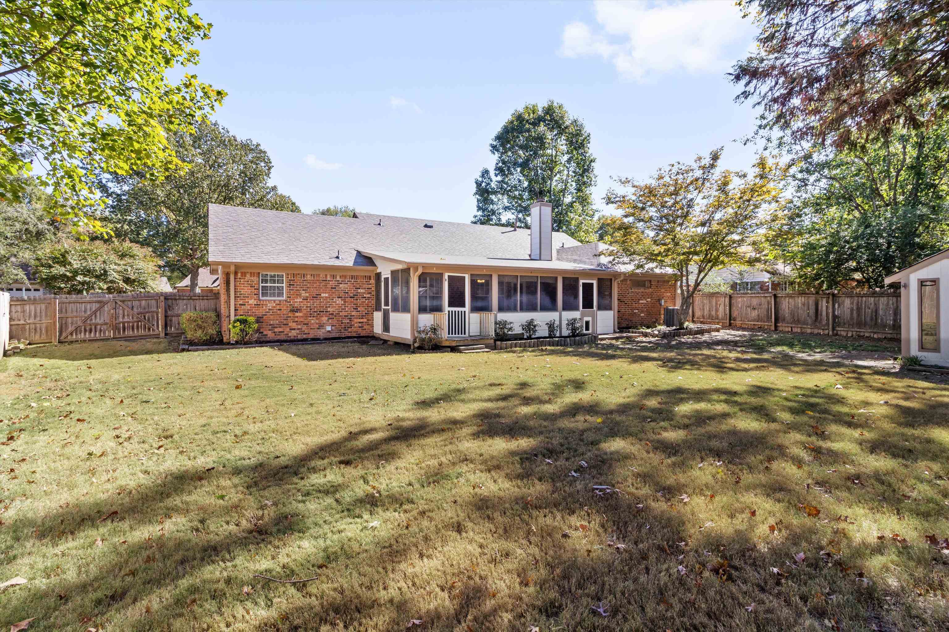 465 Harts Way Drive Collierville, TN 38017 - Photo 26 of 29 a view of swimming pool with trees in the background